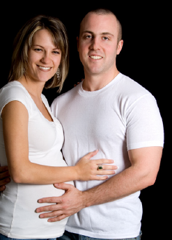 smiling pregnant couple