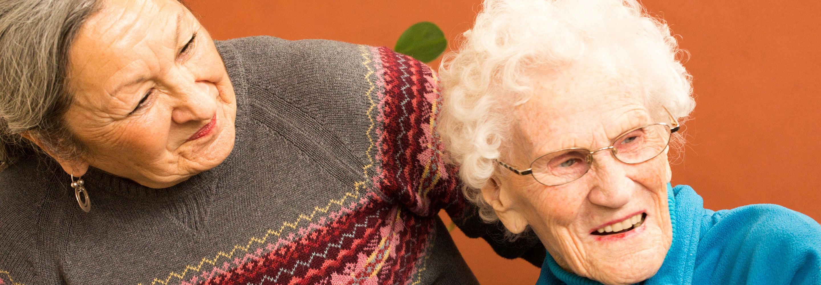 two seniors smiling